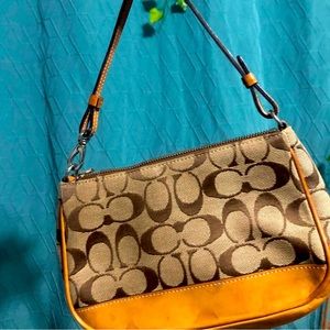 Coach vintage purse little water damage on outside but good condition